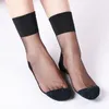 Frauen Socken 1 Paar Spitze Shinny Straße Stricken Aushöhlen Mesh Fishnet Strümpfe Mid Tube High School Elastische Lose Mischung