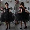 Amazing Black Feather Backless Flower Girl Dresses For Wedding Beaded Pageant Gowns Knee Length Kids Tulle First Holy Communion Dr218s
