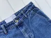 Designerjeans voor dames, herfstblauw, losse broek met wijde pijpen, heren en dames met dezelfde jeansbroek met zwaar borduurwerk