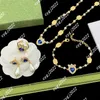 Klassiska mikroinläggningar diamanter Crystal Blue Gem Heart Pendant Necklace Fashion Armband G Letter Water Droplet Pearl Earring Ring Bröllop smycken med Box GS18