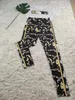 Женские брюки из двух частей, спортивные костюмы для йоги, повседневный укороченный топ с принтом и комплекты леггинсов, бесплатная доставка