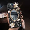 Mobiele telefoon hoesjes 15 promax telefoonhoesje strass make-up spiegel iPhone 14 zwarte bloem x volledig pakket 13 beschermhoes Q230915