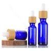 Frosted Blue Glass Dropper Bottle 5ml 10ml 15ml 30ml 50ml With Bamboo Lid Cap 1oz Bamboos Essential Oil Bottles Cxdbp