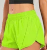 Aktiva shorts 23 färger NWT Kvinnor 2,5 tum Löst sido -blixtlåsficka Linning Gymträning Running Drawcord Outdoor Short