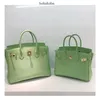 Sac à main de créateur Platinum Style d'été Vert avocat Mode Première couche Sac en peau de vache Une épaule Diagonale Croix Cuir Femme