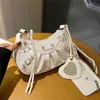 Lokomotif yeni moda çok yönlü katlanmış hilal atmosfer eğilimi bir omuz crossbody çanta kodu11