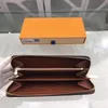 Designers de couro único zíper carteiras longas sacos de noite bolsa de moedas em relevo carteira de embreagem com caixa serial187x