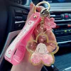 Keychains Creative Cherry Blossoms Keynchain Acrylique Moving Liquid Huile Course pour femmes fille mignon sac Key Chains Jewelry Gift255r