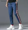 Mäns byxor 2021 Herrens andningsbara joggerbyxor Ny dragskingsportspår Pants Men Street Fashion Side Stripe Designer Joggers Casual Trousers M-5XL L230915