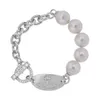 Hoge versie keizerin-weduwe Vivienne ronde merk parel OT gesp Saturnus zachte stijl armband