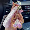 Keychains Creative Cherry Blossoms Keynchain Acrylique Moving Liquid Huile Course pour femmes fille mignon sac Key Chains Jewelry Gift255r