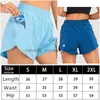 Active Set Womens Yoga Outfits High midjeshorts tränar korta byxor Fitness Wear Girls Running Elastic Adult Pants Sportkläder Fast Dry DrawString Felledl230915