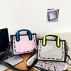 Borsa di design Elemento quadratico Borsa di tela Borsa tote cartoon Borsa a tracolla 2D 3D Borsa di tendenza divertente Borsa di animazione moda Borsa a tracolla da donna stile Ins Borsa impermeabile