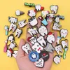 الجملة 100pcs PVC Dental Health Teath Kids حديقة السحر حذاء أحب ديكورات طبيب الأسنان الخاص بي لزر السد هدية العطلة