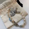 High version Vivian Saturn diamond inlaid West empress dowager pin Pearl Bracelet