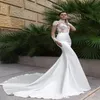 2022 New High Neck Crystal Sexy Mermaid Wedding Dresses See Through Back Sheer Long Sleeve Fitted Cheap Bridal Gowns with Sweep Tr179w