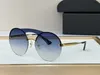 Nieuw modeontwerp rond zonnebrillen 65TS metalen frame Randloze lens eenvoudige stijl vol persoonlijkheid buiten UV400 Beschermingsglazen