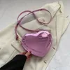 Sac de créateur Sac de coeur en forme d'amour Sac de mode Sacs de soirée Huit Bucket Designer Sacs à bandoulière en cuir pleine fleur Portefeuille latéral Bandoulière noire