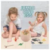 Novelty Games Dinosaur Egg Digging Blind Box Toys Archaeological Excavation Stone Boxes 12 Pcs/Box For Boy And Girl Above 6T Drop Deli Dhfpu