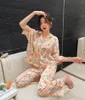 女性用スリープウェアの女性長袖ターンダウンパジャマ春秋のズボンスーツオレンジ印刷ファッションパジャマセット