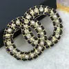 2021 new style hollow black leather braided letters brooch rhinestone pearl brass material fashion elegant jewelry306m