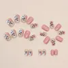 Faux ongles 24pcs tache d'encre rose blanc court faux avec colle tête carrée feuilles détachables acrylique presse sur