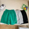 Hosen 2023 Sommer Kinder Shorts Buchstaben Stickerei Jungen lose knielange Hosen 4 Farben mittlere Jogginghose 230915