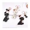 Hunddesignpåse Charm Keyring Accessories Fashion Tassel Key Rings Pu Leather Hippo Giraffe Car Keychain Holder Cartoon Jewelry Chain Pendant