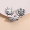 Majoras Mask Mask Pin Hylian Shield Brouches Brouches Badges Mass Adventure Games Jewelry for Fan Friends بالجملة