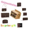 Caja ciega de Navidad Bolsos de diseñador de carteras de lujo Cajas de la suerte Un regalo misterioso aleatorio para vacaciones Cumpleaños Valor Carteras Titulares ba2792