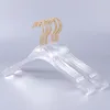 10 piezas de suspensión de trajes de ropa de cristal acrílico transparente de grado superior con gancho dorado Perchas de pantalones de acrílico transparente con clips dorados 20122060