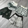 Correct Rhude Checkerboard Cashew Flower American High Street Jacquard Knitted Woolen Loose Casual Split Shorts for Men