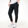 Męski technologia joggers sportowy Nylon Pencil Designer Men Kobiety bieganie długimi spodniami polarowa wełna wełniana odzież sportowa