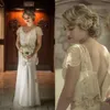 Wspaniałe bohemijskie sukienki ślubne z lat dwudziestych XX wieku V CAP Sleevs V Neck Freading Boho Bridal Suknie