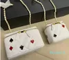 Bolsas cosméticas de patrón de insignia de mujeres Caja de cuero genuino Bolsos clásicos clásicos diseñadores de la cadena de metal Hardware Bolsas de diseñador francés