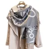 18% rabatt på halsduk Ny bokstaven Tassel Vinter varm kärngarn Scarf Förtjockad kvinnors nacke Autumn/Winter Air Conditioning sjal