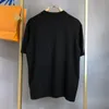 A114 MENS Fashion Designer T Shirt Högkvalitativ nyaste kvinnors bokstavstryck Kort ärm Runda hals Bomull Black White Tees Polo Ees