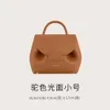 Borsa a tracolla portatile francese Poleme Bollinger Number One Nano - Camel Lychee impiombata in pelle di vacchetta