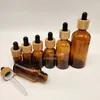 Frosted Amber Glass Droper Bottle 5 ml 10 ml 15 ml 20 lm 30 ml 50 ml 100 ml med bambu cap 1oz trä eteriska oljeflaskor bleee