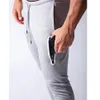 Pantaloni sportivi da uomo con cerniera laterale di nuovo design Pantaloni sportivi da jogging Pantaloni da palestra Fitness Bodybuilding Pantaloni da allenamento da uomo con M-3XL293E