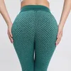 Leggings pour femmes booty soulève la couture femme pantalon de sport de yoga en nid d'abeille décontracté coloré