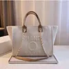 Diseñador Bolsos de noche clásicos Bolso de lujo Moda Perla Marca Etiqueta Mochila Bolsos de playa para mujer Monedero Mujeres Bolso de mano de lona Damas H009017