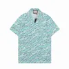 Camisas de grife masculinas 2023 novo verão manga curta camisas casuais moda solta polos estilo praia respirável camisetas roupas 15299h