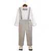 Abiti per bambini Primavera Autunno Abiti Ragazzi Camicia con bretelle Pantaloni Bowtie Set di abbigliamento Bambini britannici Host Pianoforte Performance Costume da sposa 230915