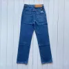 Kvinnors avslappnade ihåliga lowe byxor med broderade loewes raka loewe street designer lapp utsmyckad denim blå når hink denim höjd