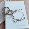 Designer Car Key Carabiner Keychains Mens Anagram Pendants LoweeeYiwi Key Chain Lover Couple Bags Pendants Luxury Metal Keyrings Silver Gold Keys