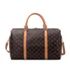 Klasyczna swobodna torba mody mody keepall bandouliere luksusowe monogramy torebki Kobiet mężczyzn projektant bagażu duża pojemność lug168f