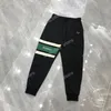 22ss Mens Mulheres Designer Calças Metal Triângulo Etiqueta Verde Stripe Calça Homens Webbing Calças Preto Xinxinbuy S-XL239P