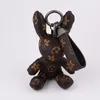 Nyckelringar Bunny Rabbit Bag Keychains Keys Holder Pu Leather Animal Key Chains Rings Brown Flower Pendant Lanyard Keyrings Charm Cartoon Design Fashion Accessories