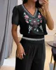 Pantaloni a due pezzi da donna Set top con stampa floreale tribale animalier T-shirt a maniche corte con scollo a V primavera estate T-shirt a fiori a vita alta